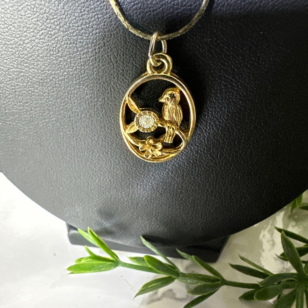 Vintage 18k gold plated bird and flower pendant